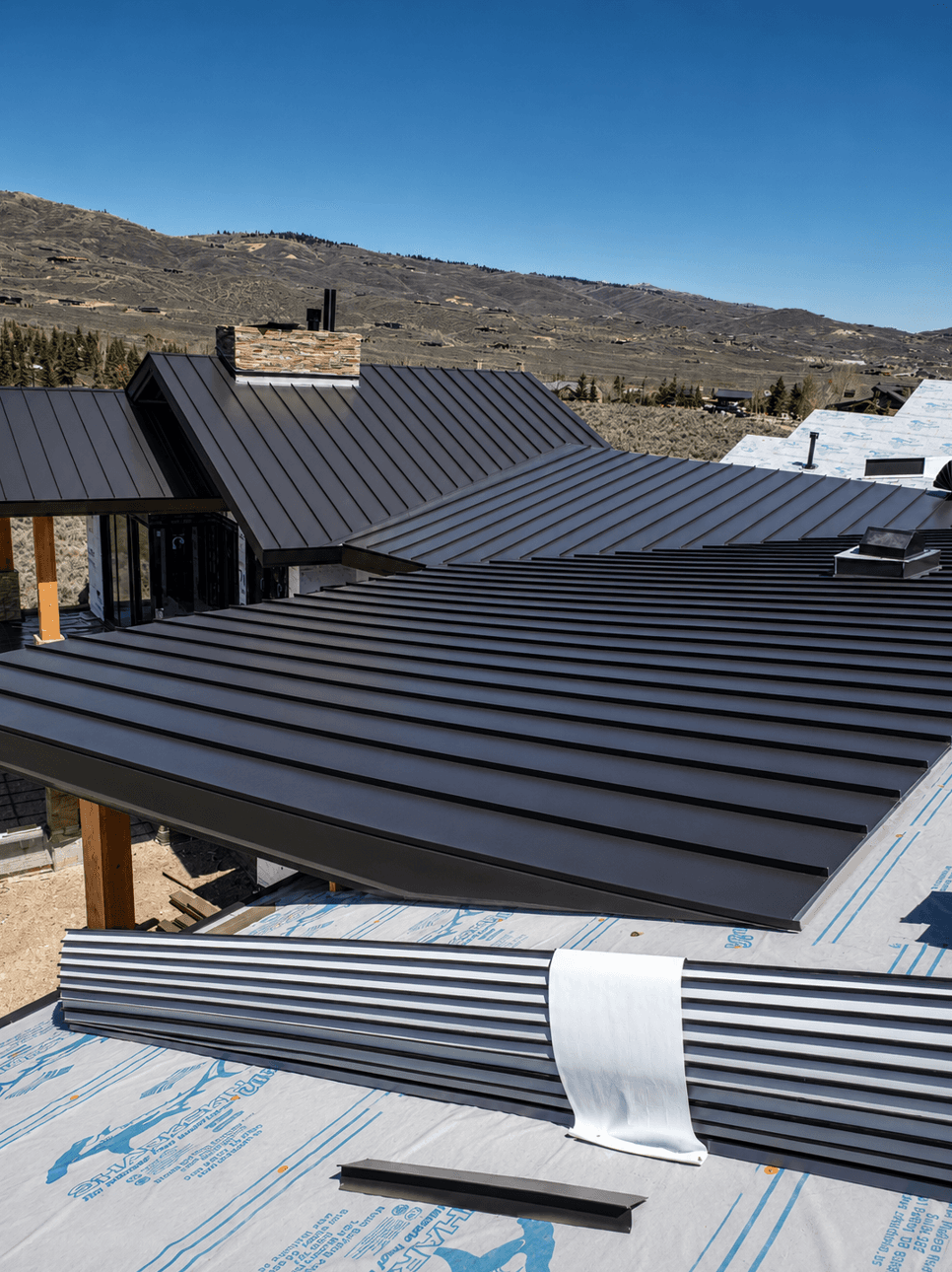 Completed standing seam metal roofing system